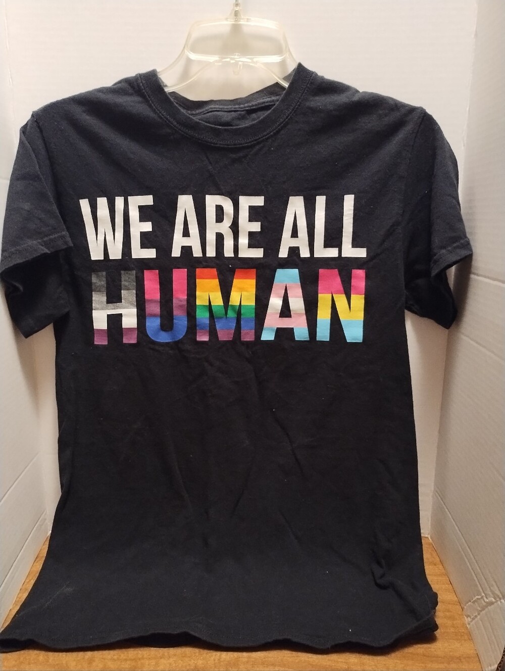 Black "We Are All Human" Graphic Tee - Rainbow Lettering